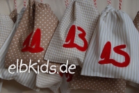 Adventskalender in beige/weiss